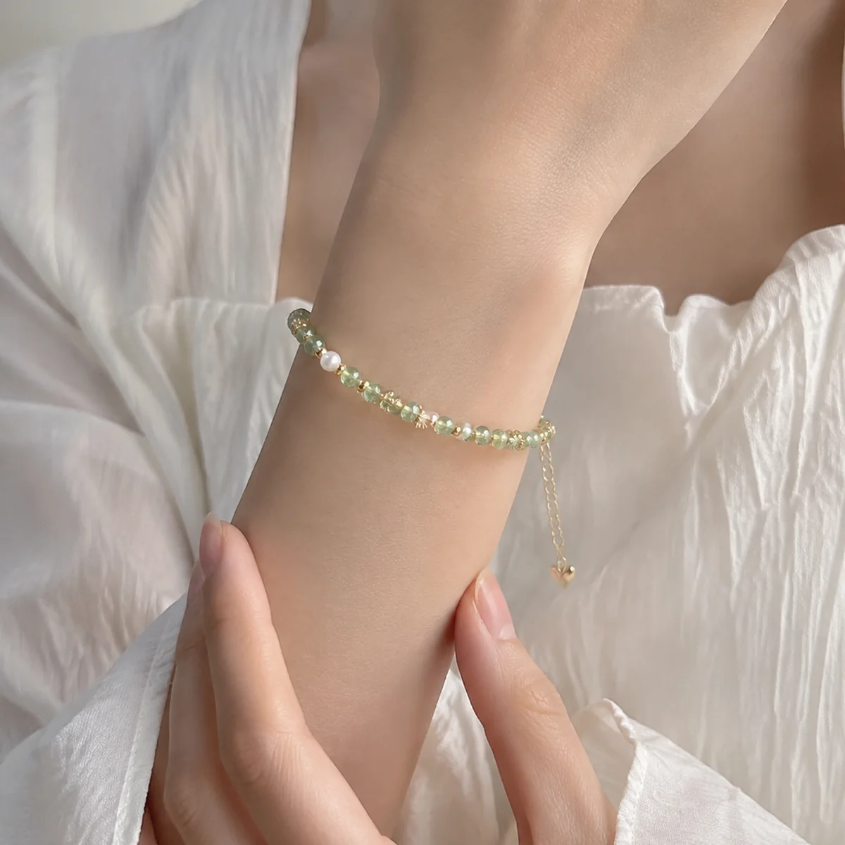Peridot Daisy Pearl Bracelet worn or styled