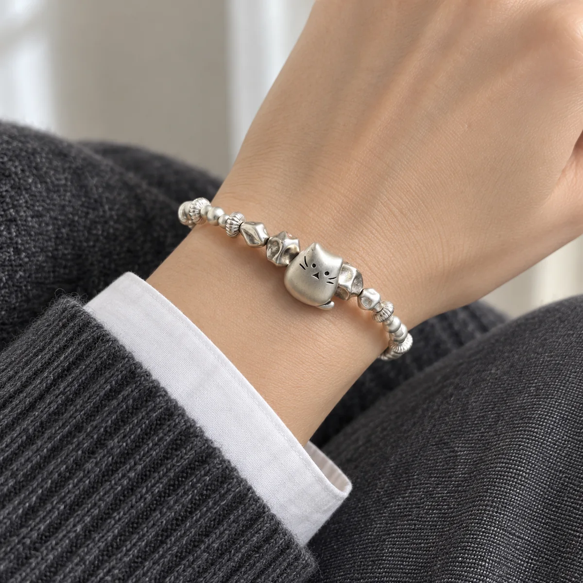 Silver Cat Bracelet worn or styled