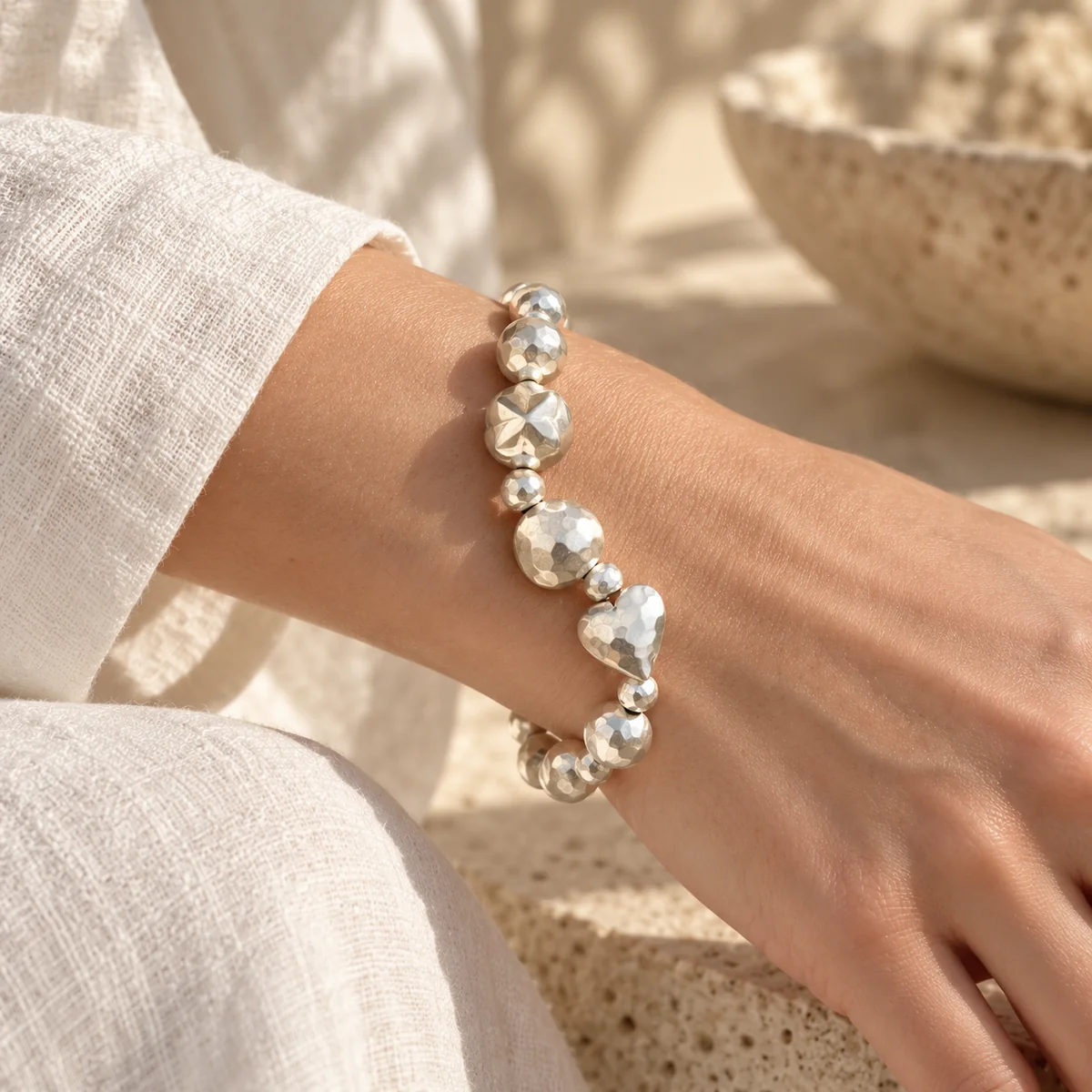 Hammered Heart Silver Bracelet worn or styled