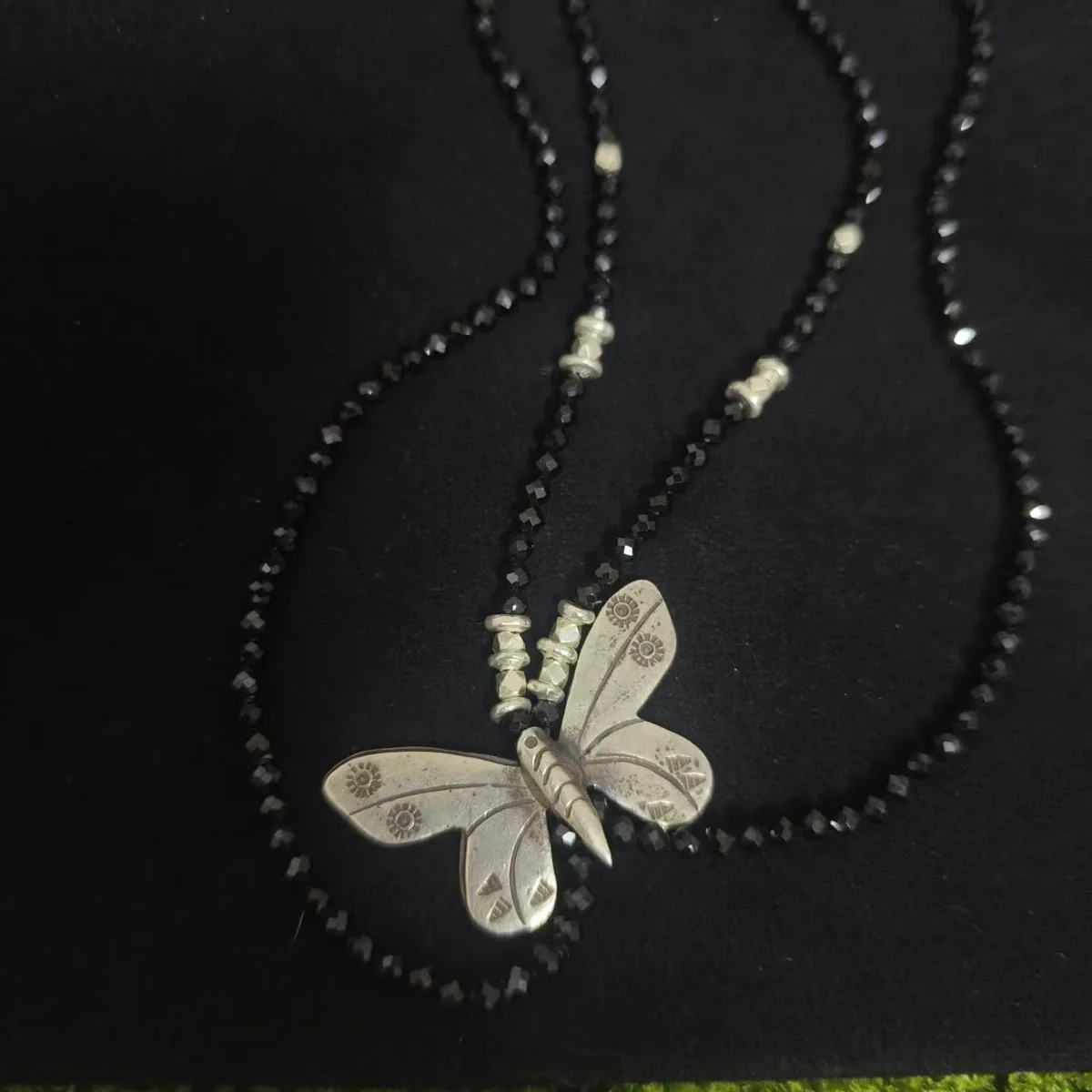 Customer wearing SLV-007 necklace