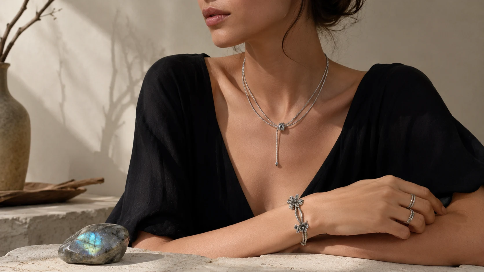 TRIJORA silver jewelry worn with a blue-flash labradorite stone