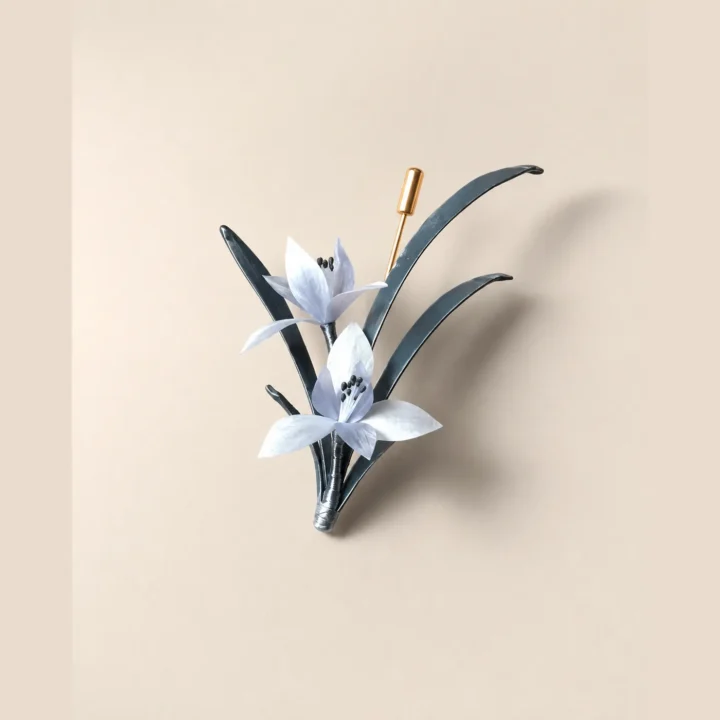 Three-Color Floral Spray Ronghua Brooch handcrafted mulberry silk Ronghua floral brooch on a light background
